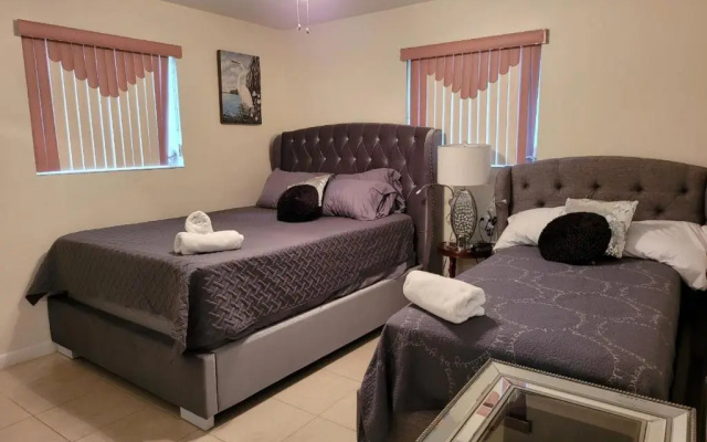 photo 2 of JUNGLE TO BEACH 4 R 3 BR Family and Pet Heated pool N Airport N Beach N Hard Rock