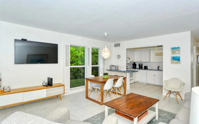 photo 3 of LaPlaya 101A Step out to the beach from your screened lanai Light and bright end unit