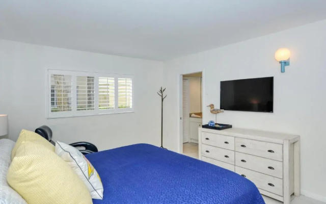 photo 5 of LaPlaya 101A Step out to the beach from your screened lanai Light and bright end unit