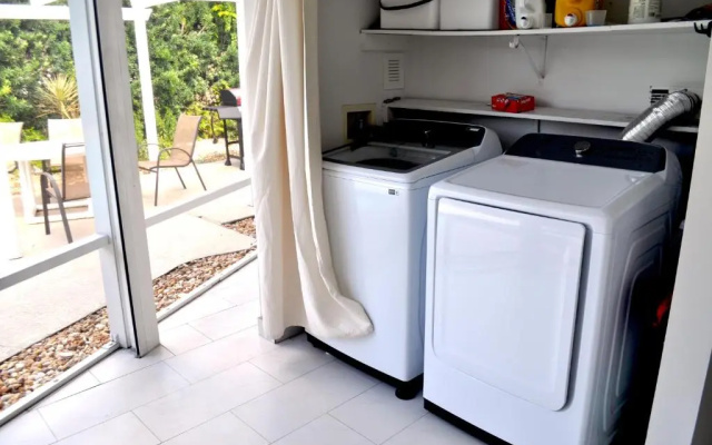 photo 4 of Lovely 3-bd, walk to bars, 9 min drive from beach! Heated pool.