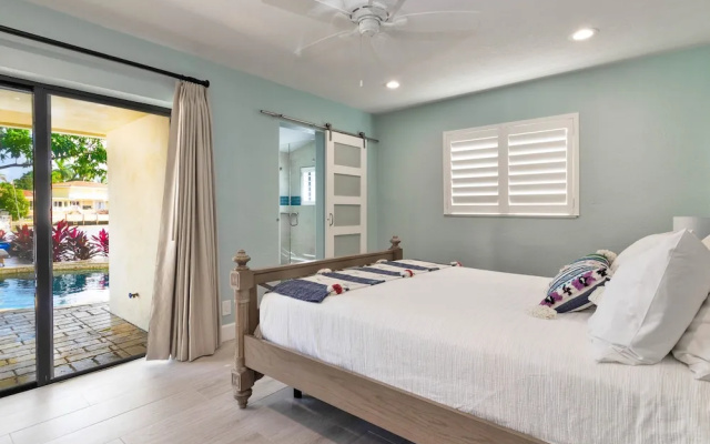photo 4 of Luxe Waterfront : Pool, Boat Dock, Near Beach 4 Bedroom Home