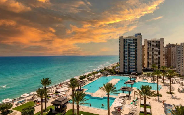 photo 2 of Luxurious Beach Resort 3 BR 3 BA with OCEAN view Insta worthy Pool