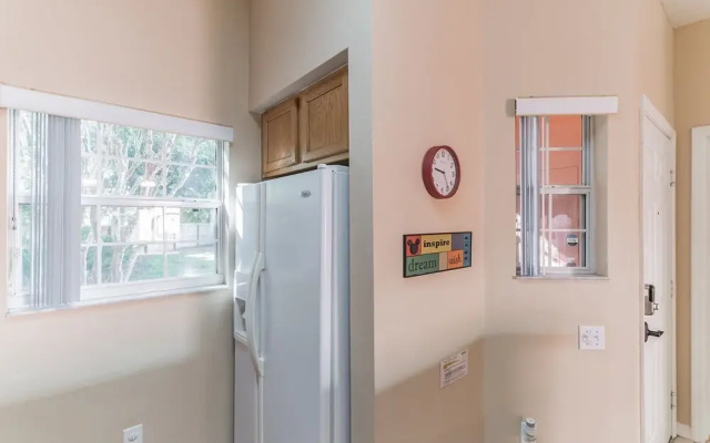 photo 2 of Mickey's Magic Retreat - Condo In Gated Community With Private Back Patio & Hot Tub! 3 Bedroom Townhouse by Redawning