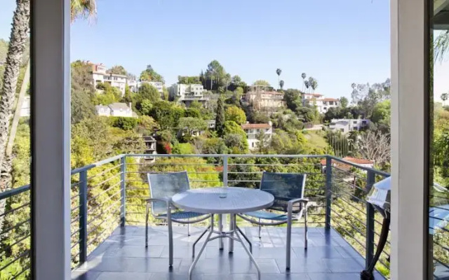 photo 3 of MidCentury Poolview Retreat by LuxPads