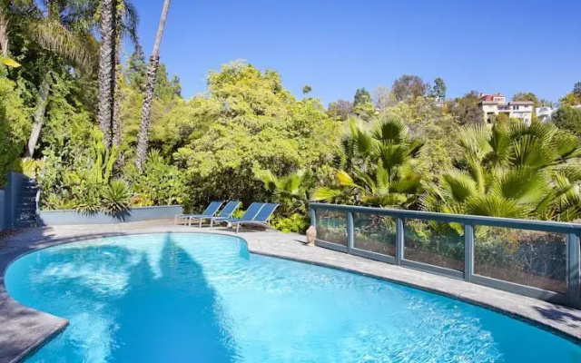 photo 5 of MidCentury Poolview Retreat by LuxPads