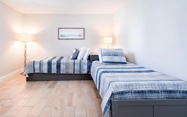 photo 4 of NEW Beach Condo 5 min walk to the Beach Sleeps 9