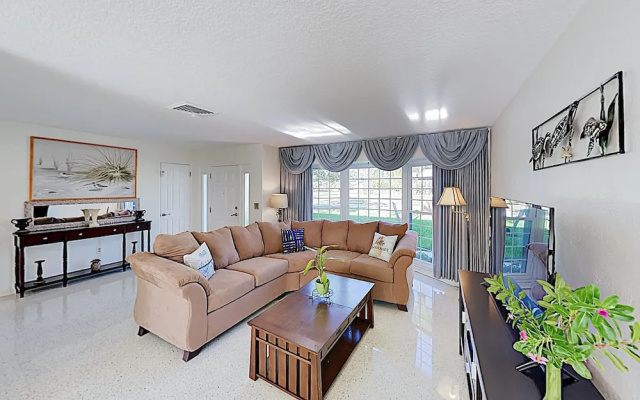 photo 2 of New Listing! Canal-front Escape W/ Private Yard 3 Bedroom Home