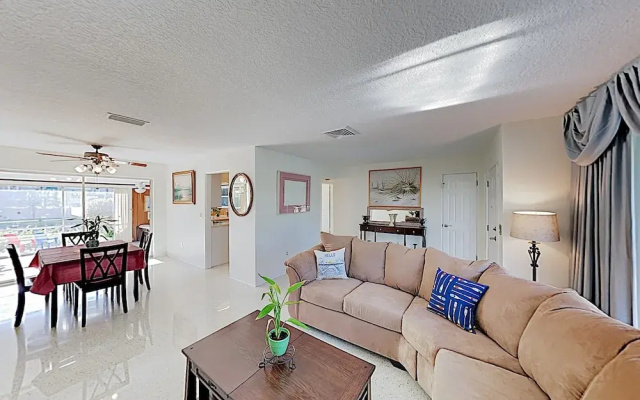 photo 3 of New Listing! Canal-front Escape W/ Private Yard 3 Bedroom Home