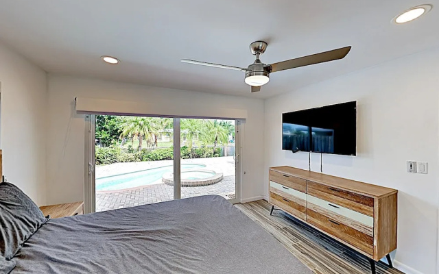 photo 5 of New Listing! Canal-front W/ Private Pool & Hot Tub 3 Bedroom Home