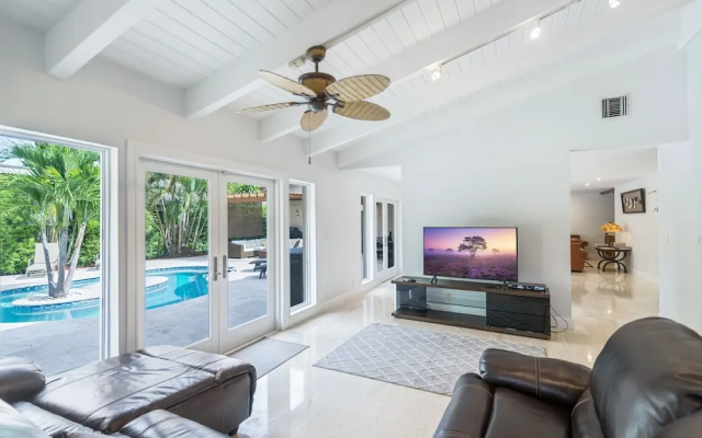 photo 3 of New Listing! Luxe Waterfront W/ Pool & Boat Dock 5 Bedroom Home