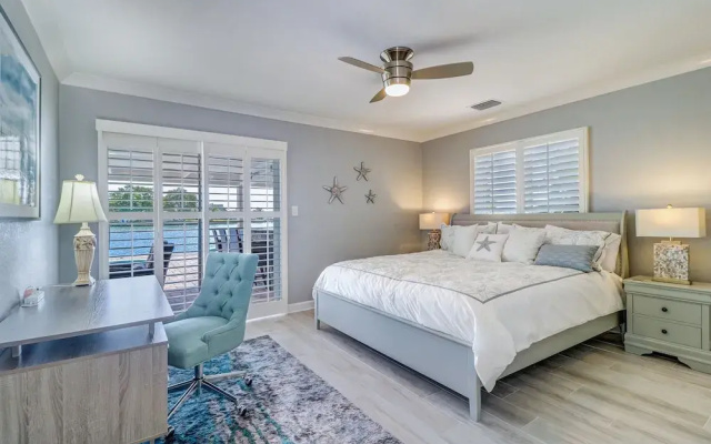 photo 5 of New Listing! Modern W/ Private Pool & Dock 3 Bedroom Home