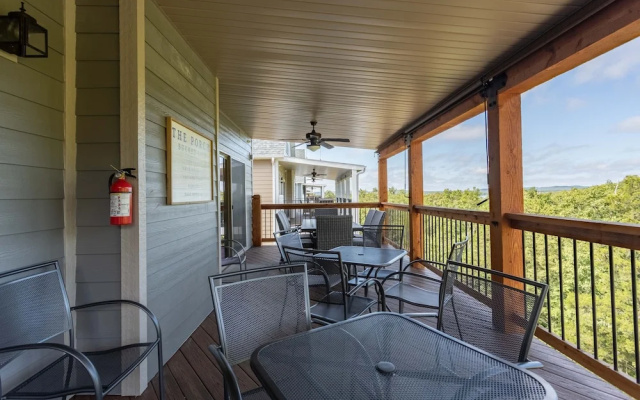 photo 2 of Ozarks Peak - Sleeps 25 7 Bedroom Home by Redawning