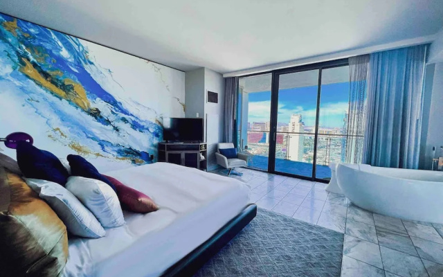 photo 2 of Panoramic Strip Views Open Balcony Free Parking High Floor Sleeps 4
