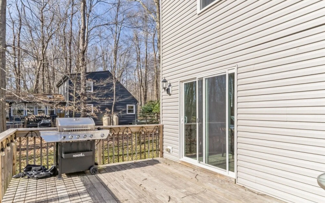 photo 4 of Pocono Retreat: Lake, Firepit, Bbq, Gameroom, Ski 4 Bedroom Home by RedAwning