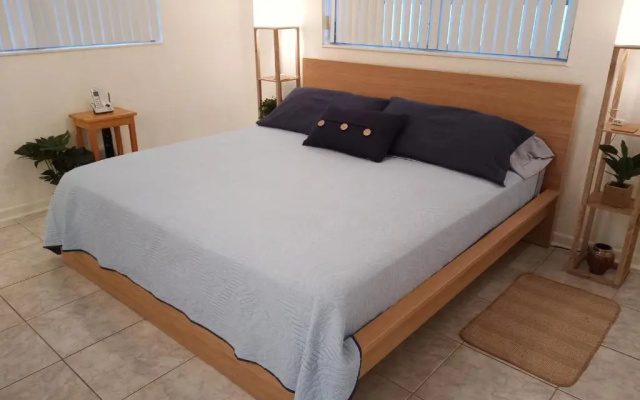 photo 3 of Private designer 8 room art getaway 2 Br-2Ba Full Kitchen Barbecue Patio 2min to beach