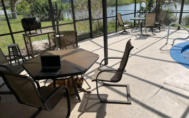photo 5 of Private Tropical Waterfront Sanctuary with pool, hot tub & an island!