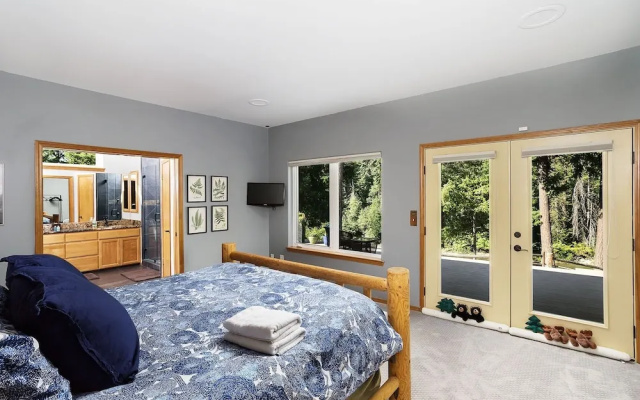 photo 5 of Riffle River Lodge 3 Bedroom Home by NW Comfy Cabins by RedAwning