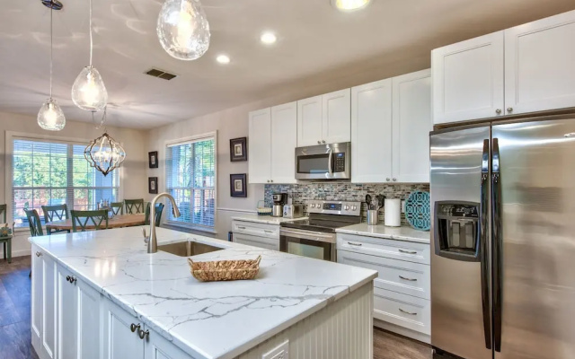 photo 2 of Sardinia Vacation Rental: Delightful Coastal Home near Vanderbilt Beach. Relax in a Private Pool and Spacious 4-BR Retreat with Modern Amenities. Ideal for Families. Minutes from Mercato and Local Attractions