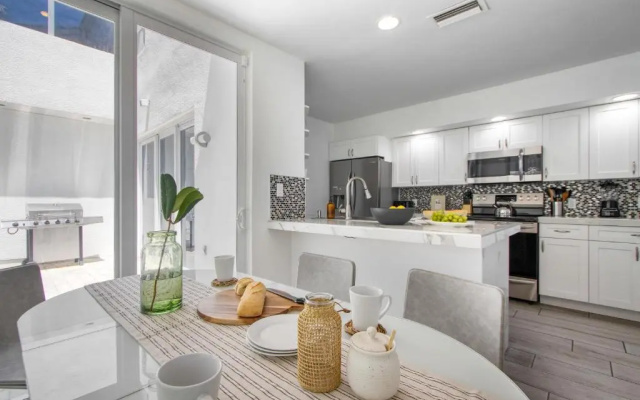photo 5 of Sea Breeze by Avantstay Across From Fort Lauderdale Beach! Pool, Out Door Dining, Fire Pit!