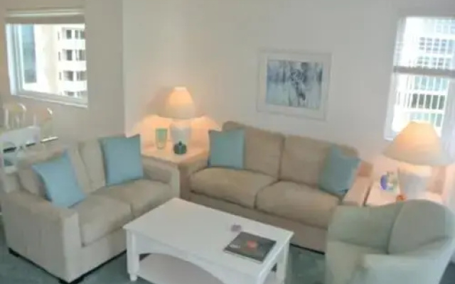 photo 4 of Deluxe Beachfront Condo Located in Prestigious Resort with Pool and Hot Tub by RedAwning
