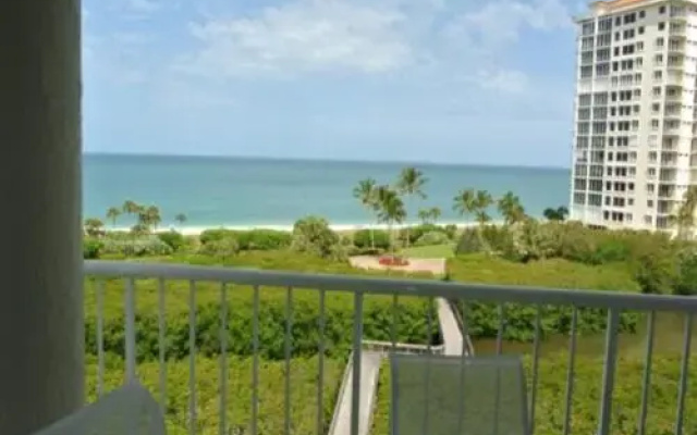 photo 5 of Deluxe Beachfront Condo Located in Prestigious Resort with Pool and Hot Tub by RedAwning