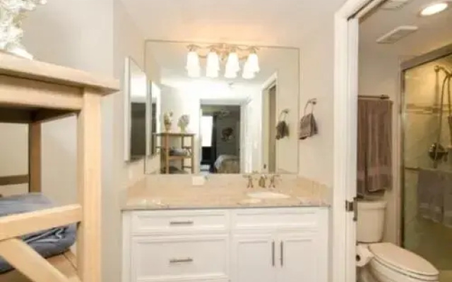 photo 4 of Luxury Gulf-Front Condo Located in Distinguished Area with Pool and Hot Tub by RedAwning