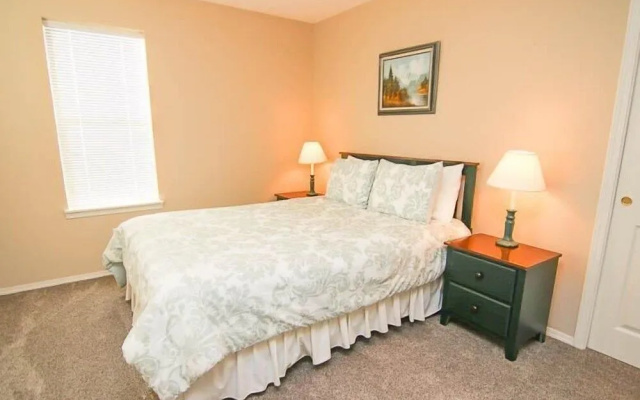 photo 2 of Cozy Gathering Space and Sparkling Amenities - Charming Seaside Haven