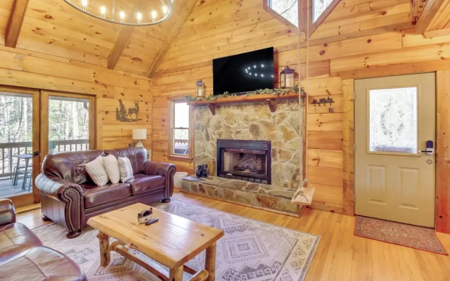 photo 3 of Secluded Cherry Log Cabin w/ Hot Tub + Swings!