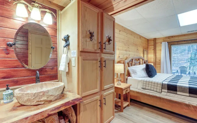 photo 4 of Secluded Cherry Log Cabin w/ Hot Tub + Swings!