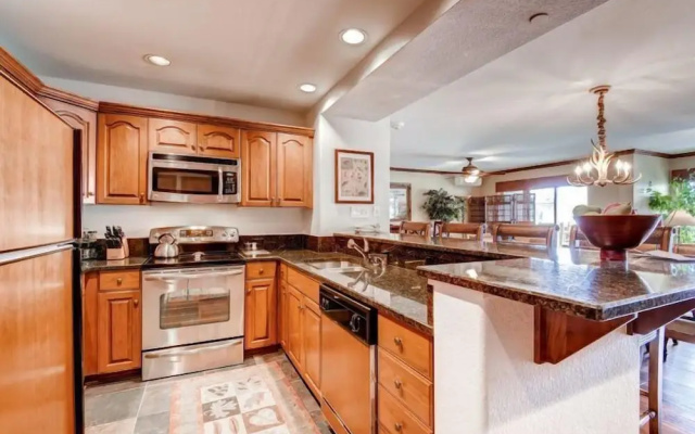 photo 3 of Ski, in Ski out 2 Bedroom Vacation Condo With Resort Amenities That Include Exercise Center, Indoor Pool, and Hot Tubs