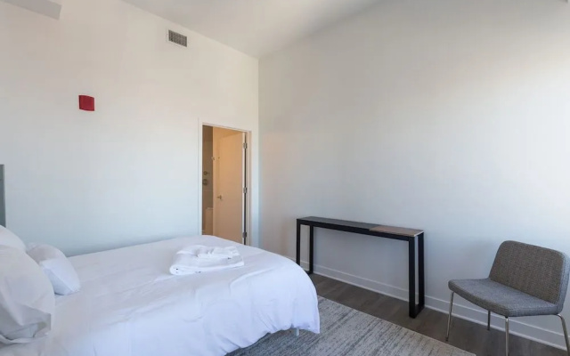 photo 3 of Sky on Main - Luxe DT Apts with Gym + Roof Terrace by Zencity