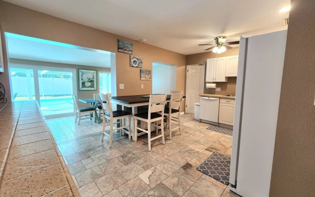 photo 2 of Sleeps 12 4 Bedroom Pool Home Close to Beaches Restaurants & More 4 Home by Redawning