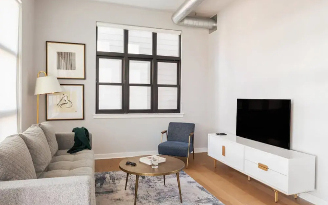 photo 2 of Sosuite Corner 1BR Apt w W/d, Shared Roofdeck