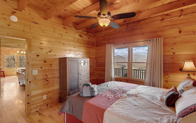 photo 4 of Spacious Cabin With Fantastic Long Range Mountain And Lake Views - Lake Lure - The Overlook 4 Bedroom Cabin by Sunscape Property Management