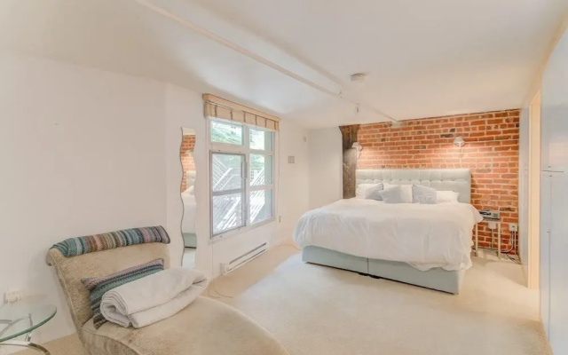 photo 3 of Spacious Luxury Historic Loft In Downtown Sf 2 Bedroom Condo by RedAwning