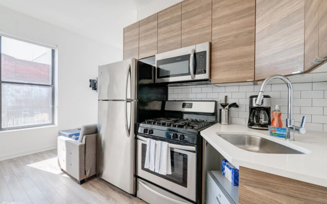 photo 2 of Steps From (Arguably) The Best Pizza Spot In Chicago - Experience The Local Chicago Lifestyle - 747 Lofts Cabin 208  by RedAwning