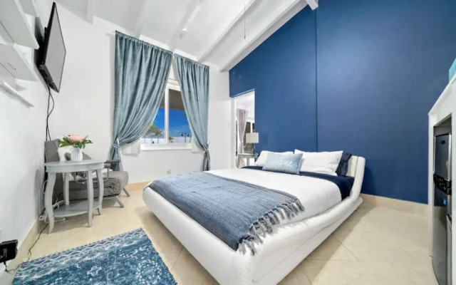 photo 2 of Studio On The Sand! Wake Up To The Waves/30day Min Studio Bedroom Home