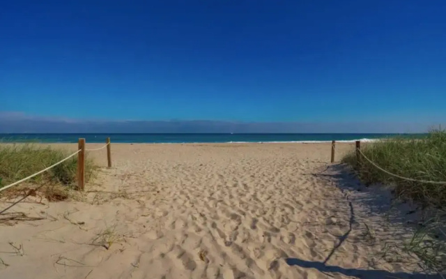 photo 4 of Studio On The Sand! Wake Up To The Waves/30day Min Studio Bedroom Home