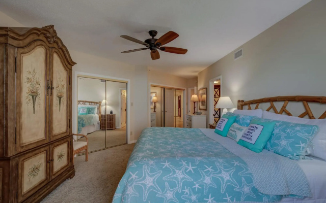 photo 2 of Stunning ground floor condo with lush lawn overlooking white sands