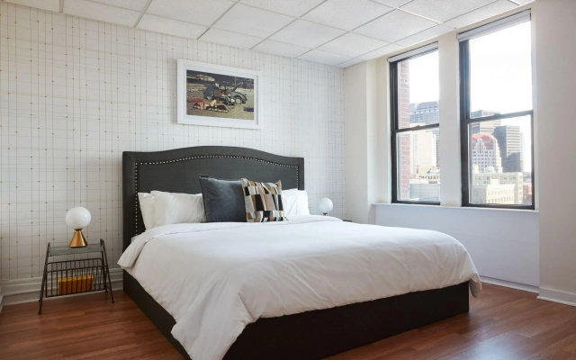 photo 2 of Stylish 1BR + Train | Theatre District | Evonify