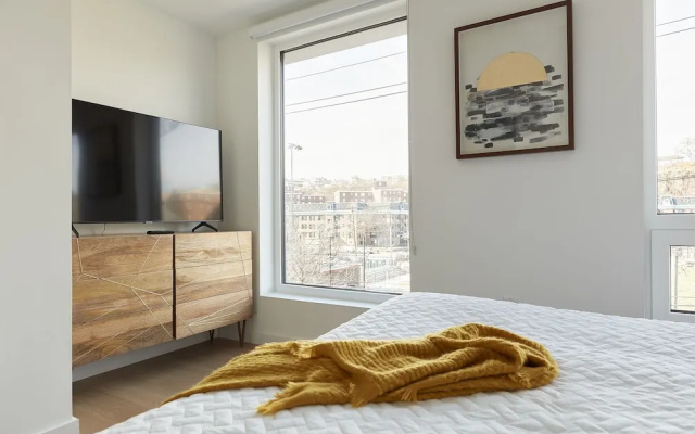 photo 5 of Stylish 2 BR w Roof Deck Access - Mins to NYC
