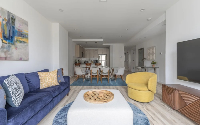 photo 2 of Sun-kissed 3BR Loft With Patio Minutes to NYC