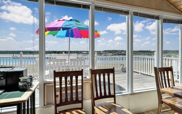 photo 5 of Twin Sails - W006 Beach House At The End Of Atlantic Ave With An Amazing Sunset View 2 Bedroom Home by RedAwning