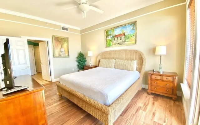 photo 2 of Wonderful Tropical Condo with Beach and Fitness Center Access - Unit 0102 by RedAwning