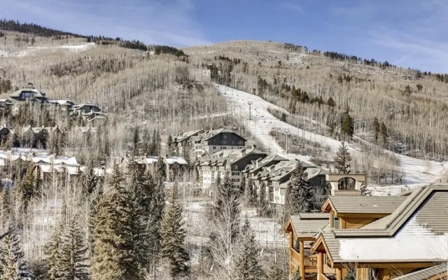 photo 2 of Upscale Ski in, Ski out 1 Bedroom Mountain Vacation Rental With Access to Outdoor Heated Pool, Hot Tubs, and Private Ski Lockers