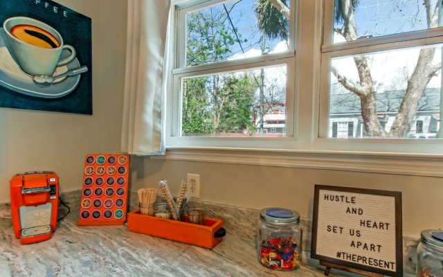 photo 2 of Vibrant, Colorful Condo Building With Backyard Firepit and Games