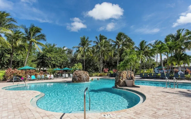 photo 2 of Asiago Vacation Rental at Lely Resort. Newly Furnished 2-Bedroom Condo with Stunning Lake & Golf Views. Spacious Retreat with Private Lanai, Resort Pool, Hot Tub and Gym Access