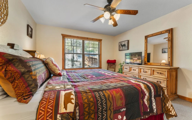 photo 3 of Whispering Woods Lodge - Sleeps 6 2 Bedroom Home by RedAwning