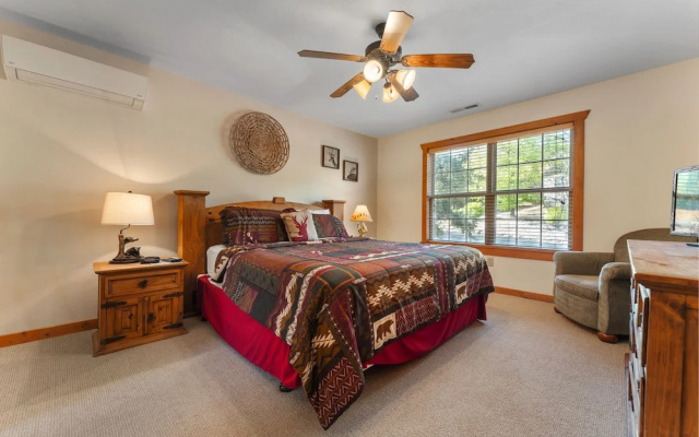photo 5 of Whispering Woods Lodge - Sleeps 6 2 Bedroom Home by RedAwning