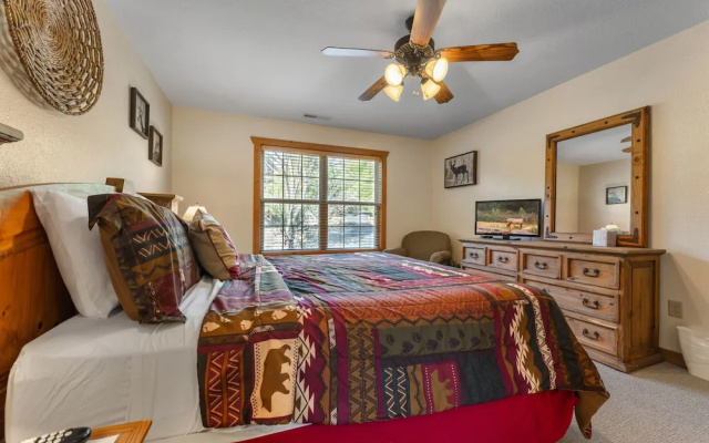 photo 2 of Whispering Woods Lodge-sleeps 10 4 Bedroom Home by RedAwning